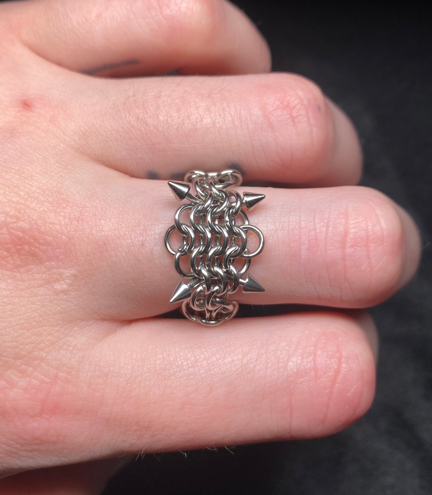 Fanged ring