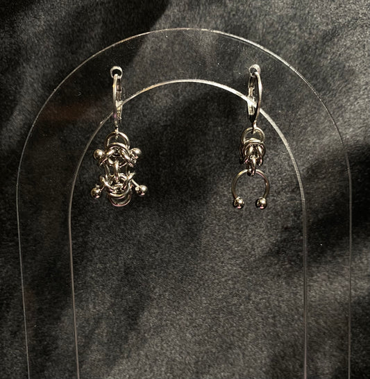 Pierced beetle earrings